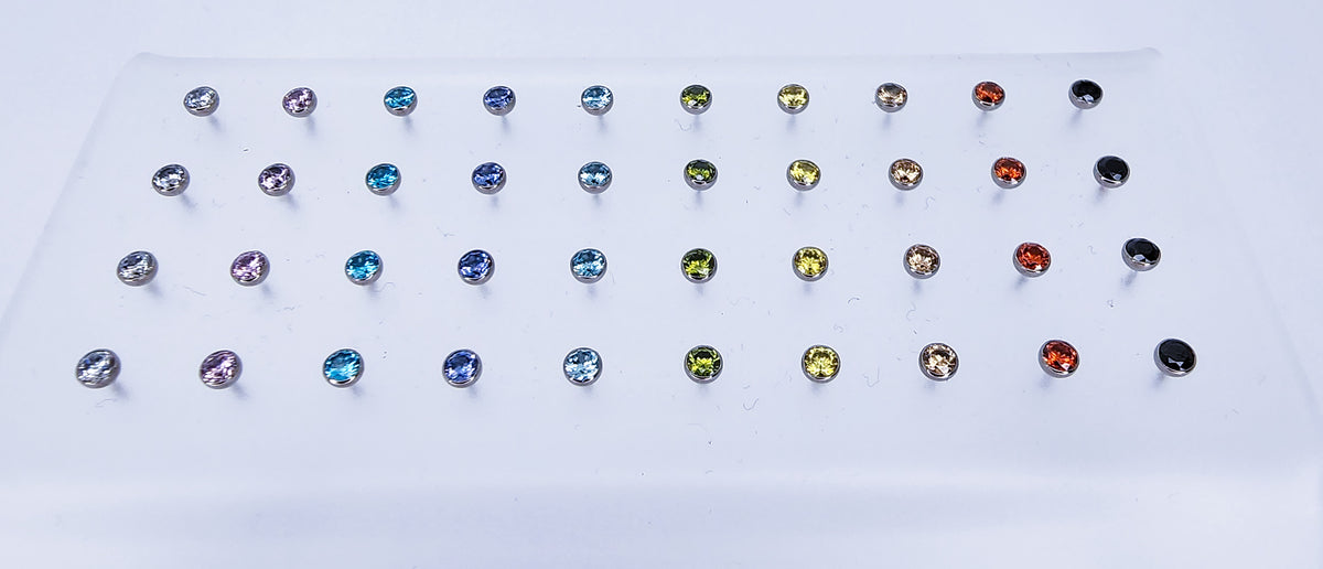 Titanium threadless gemstone ends arranged in a multicoloured grid