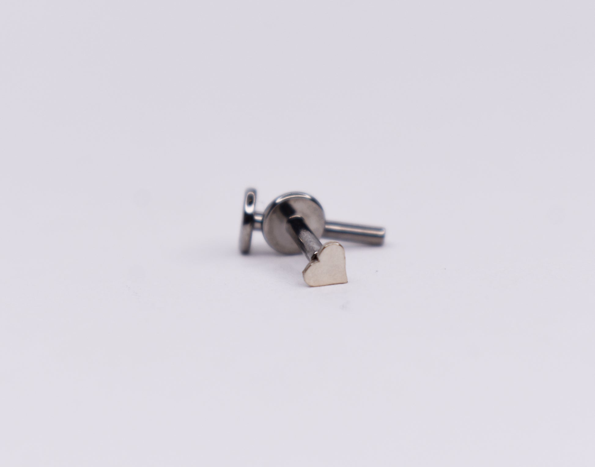 Solid 14kt Yellow gold Heart threadless top. Titanium threadless labret 4mm disc.