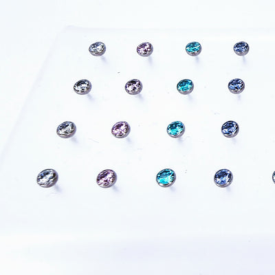 Titanium threadless gemstone ends in clear, purple and blue colours